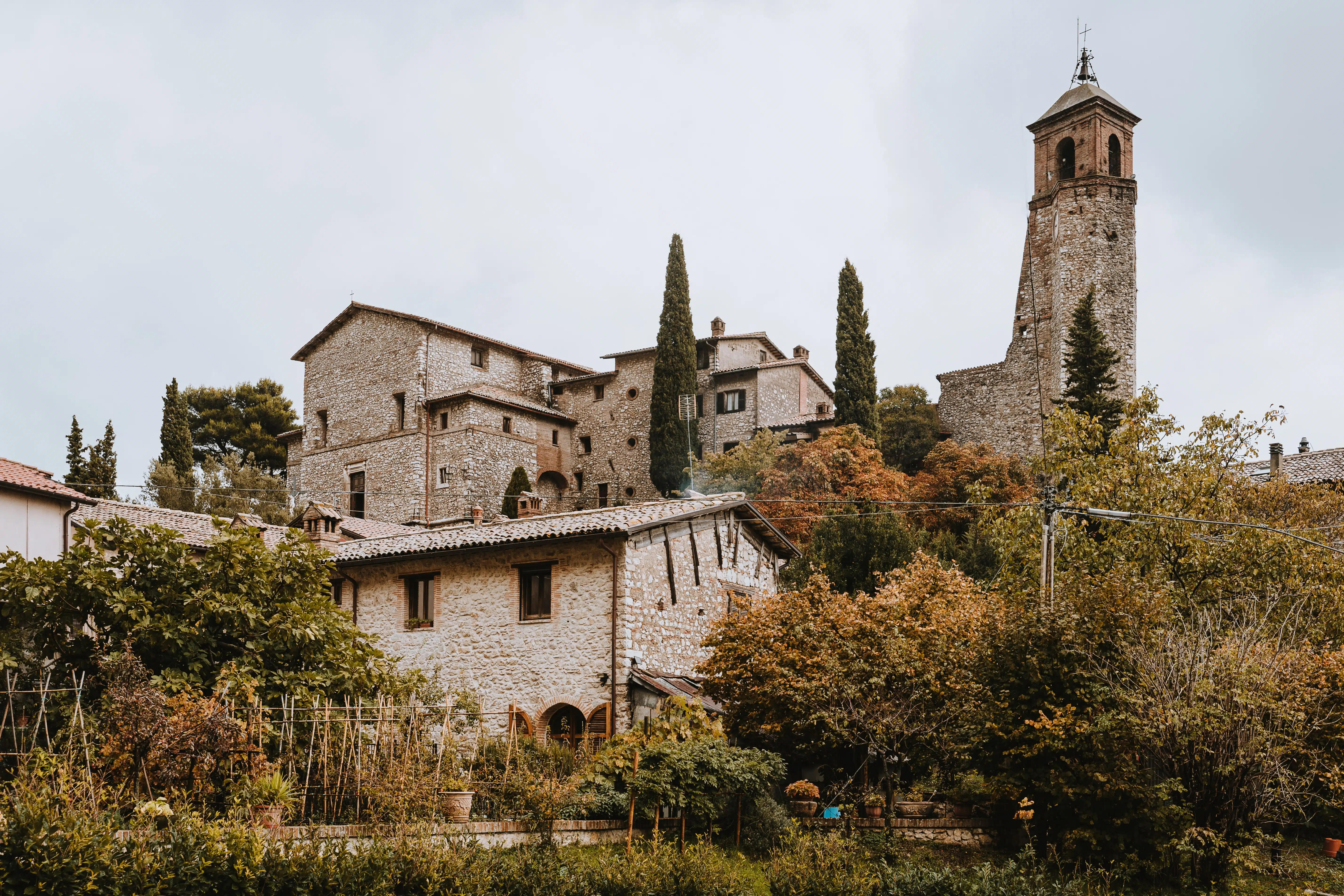 The fourteenth century Catholic church of the Archangel St Michael and bell tower in Greccio, Italy, founded by St Francis of Assisi