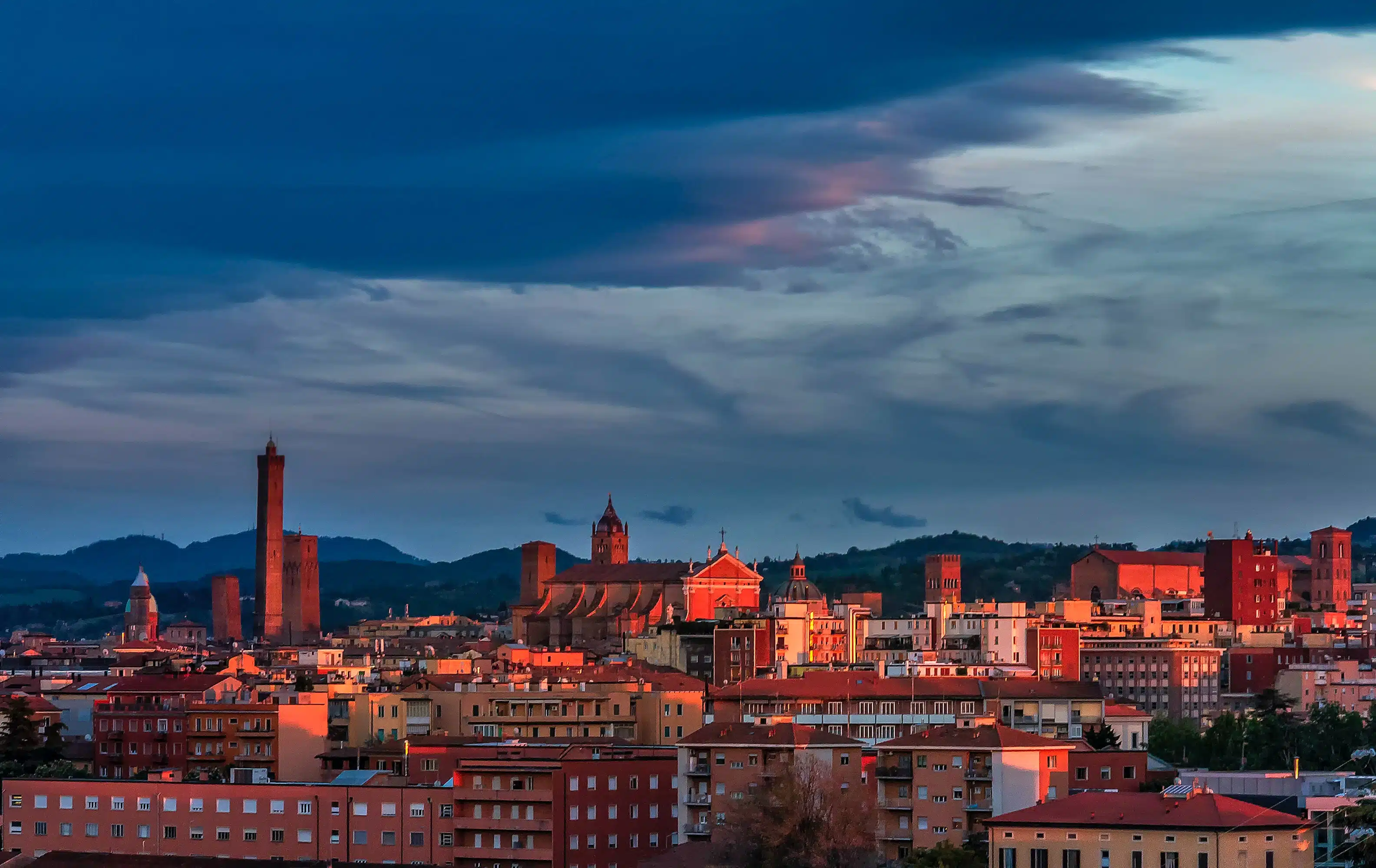 sunset over bologna skyline provinces italy