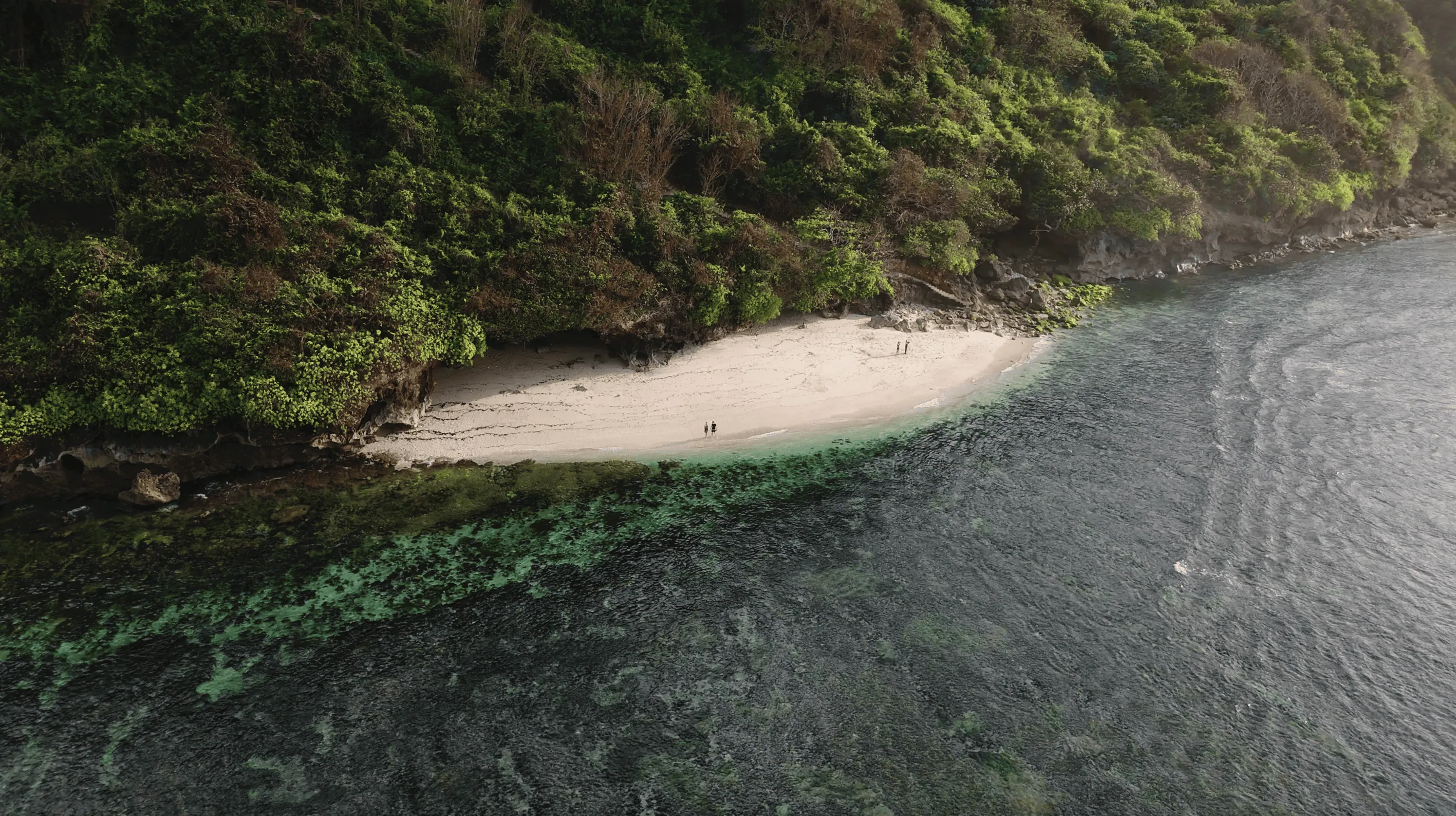 Green bowl beach with Tropical Ocean in Bali Aerial View of Green Bowl Beach with Morning Light