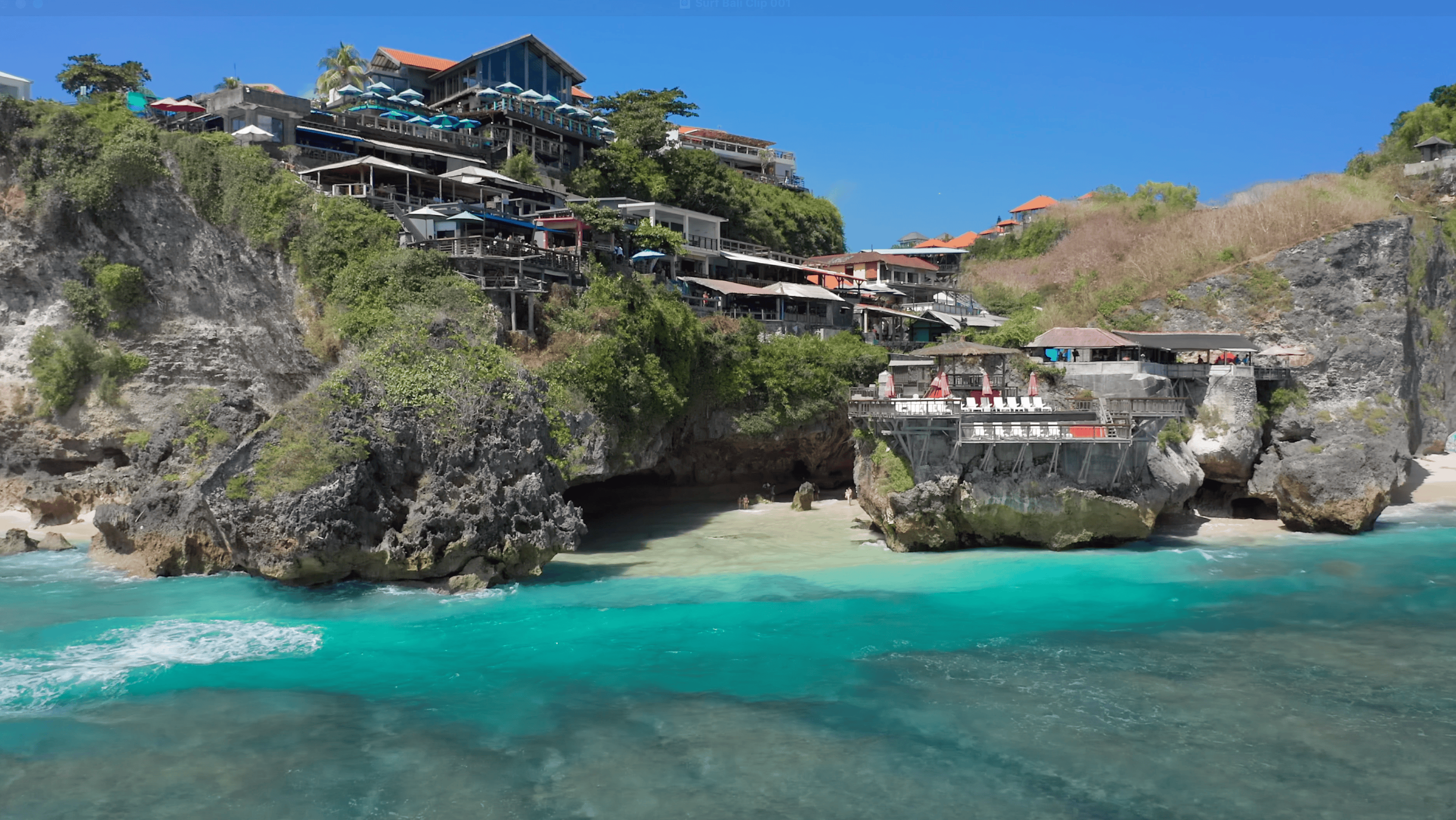 Complete Guide to Suluban Beach (in 2026) 2 Suluban Beach is surrounded by cliffs and hotels.
