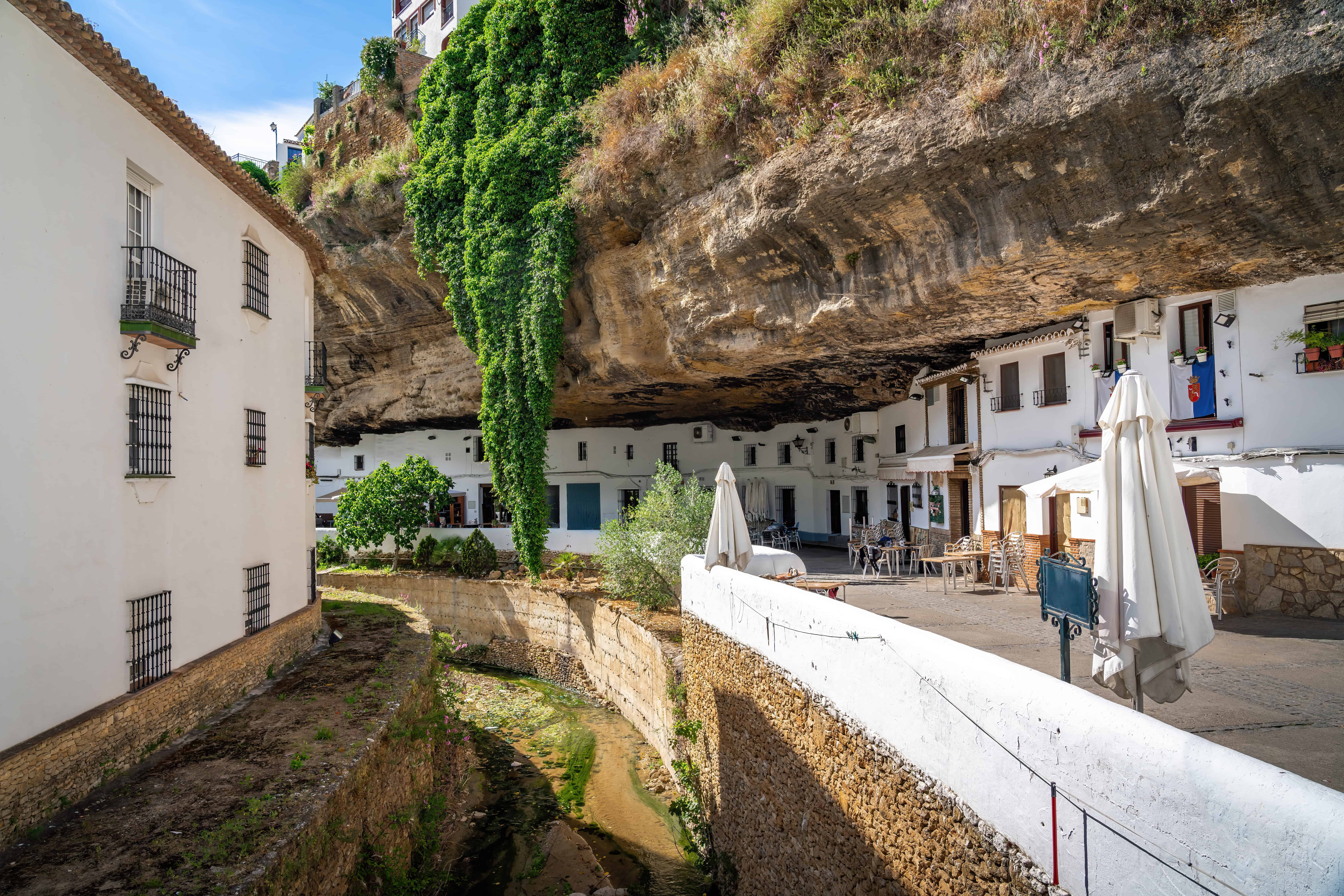 Calle Cuevas del Sol Street with Rocks dwellings and restaurants, Setenil de las Bodegas, Andalusia, Spain