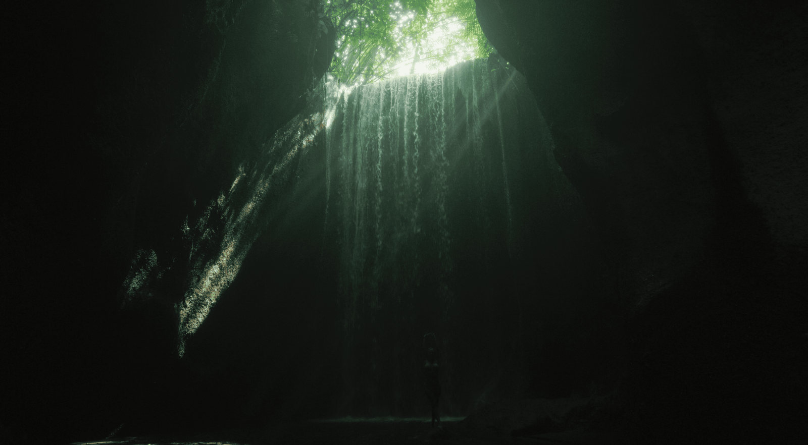 Tukad Cepung Waterfall: Why you MUST Go! (FULL Guide 2026) 10 Rays of light at Tukad Cepung Waterfall in Bali, Indonesia