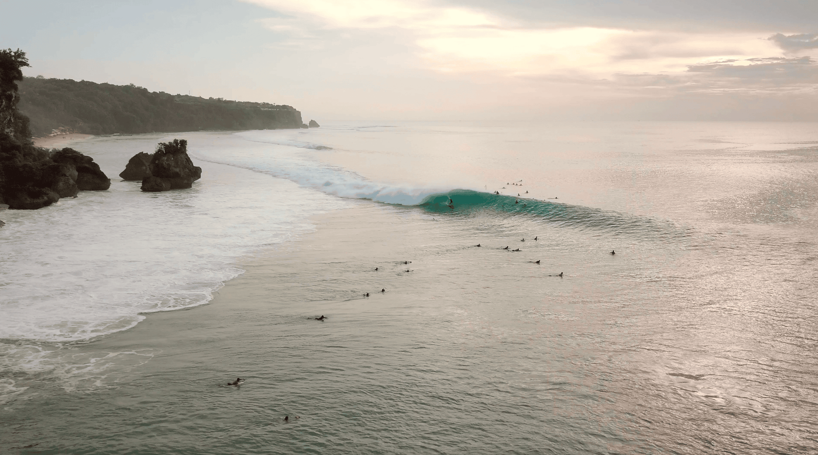 20 Fun Tips to Visit Padang Padang Beach Uluwatu 18 Padang Padang surfers catching waves