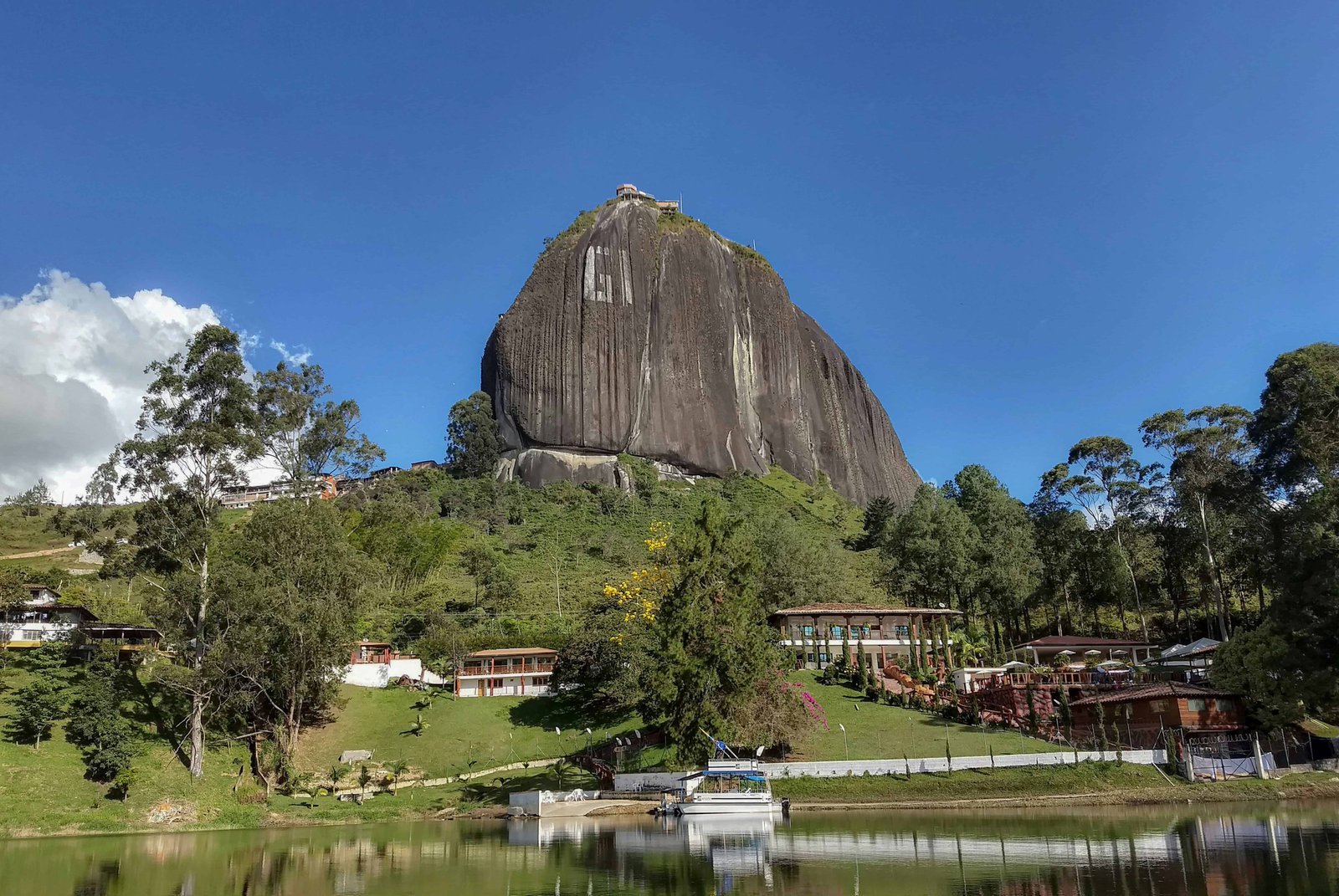 Guatape: The Truth About Visiting In 2026! 2 Guatape with a view over Piedra Del Penol.