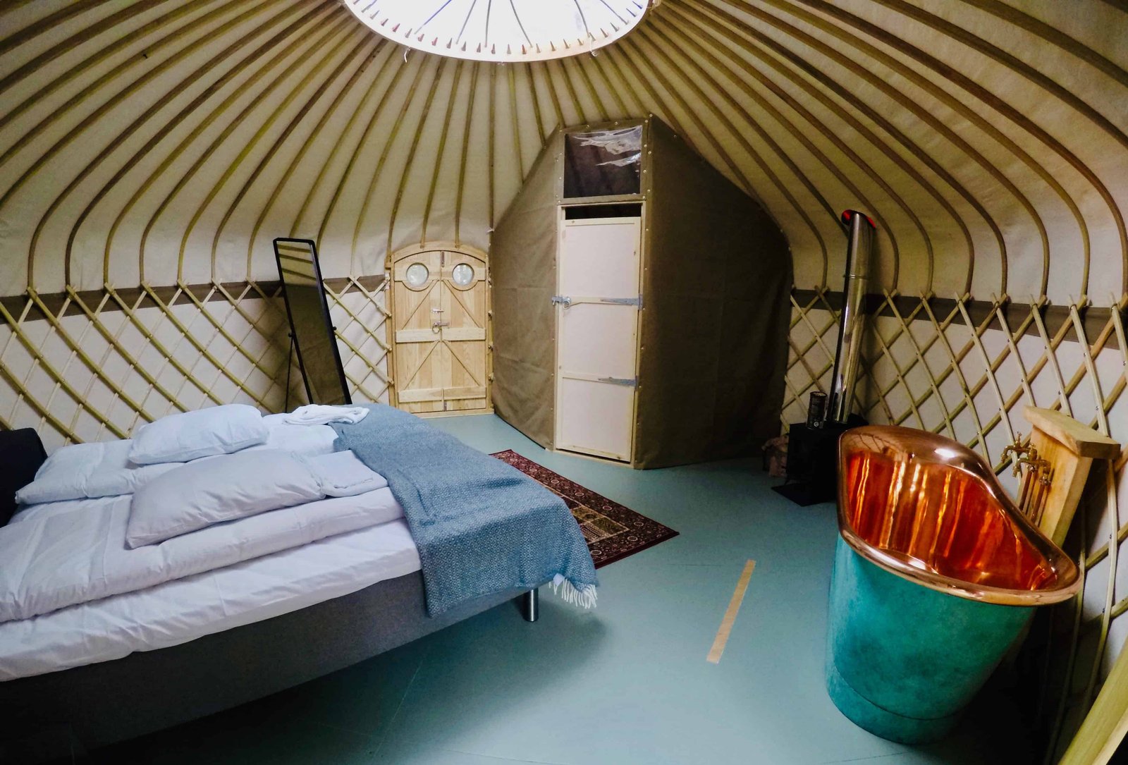 15 Best Places For Glamping In Iceland in 2026! 3 Inside of a glamping tent