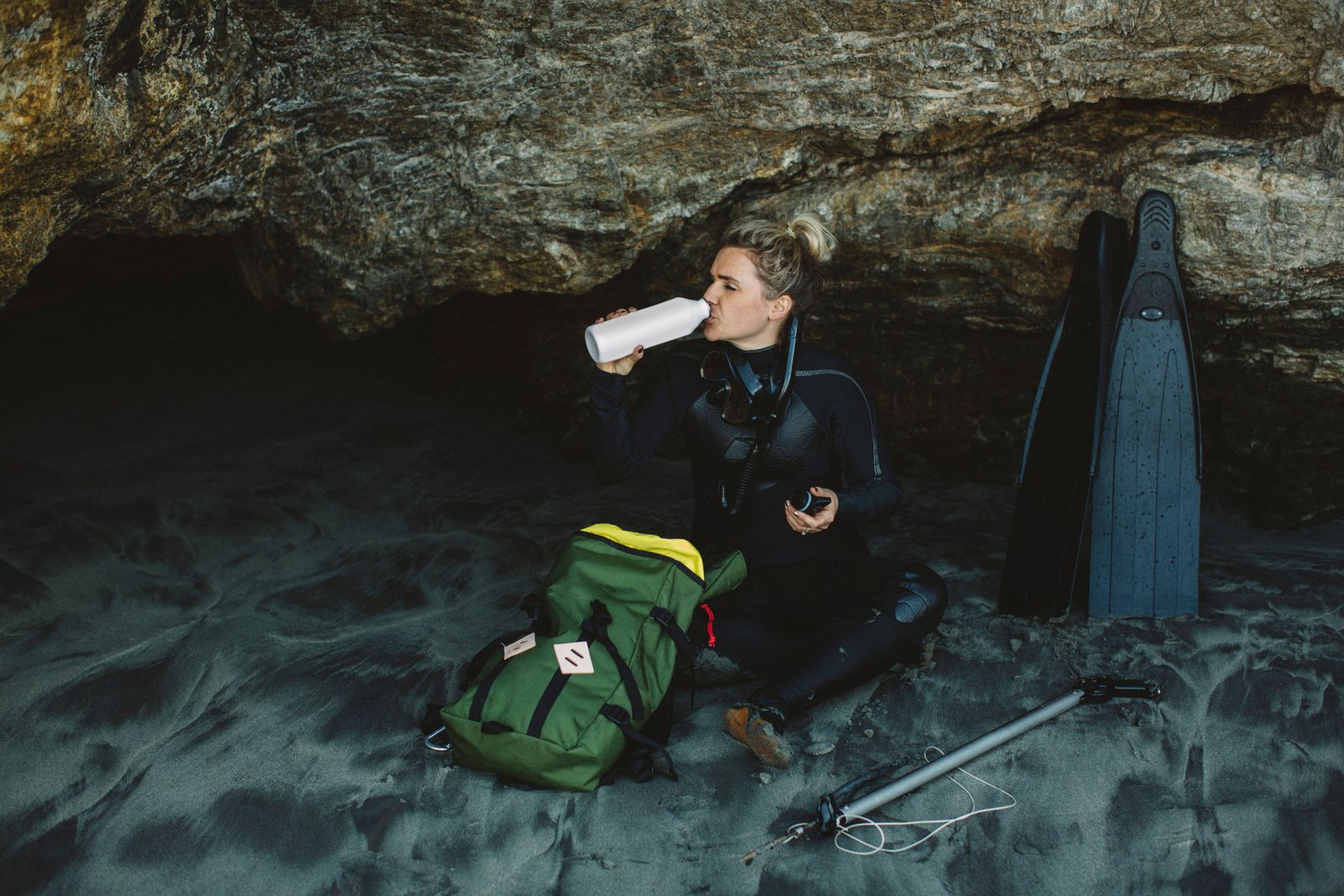 Golden Circle Iceland: First Timer's Guide 7 Diver taking a break inside a cave