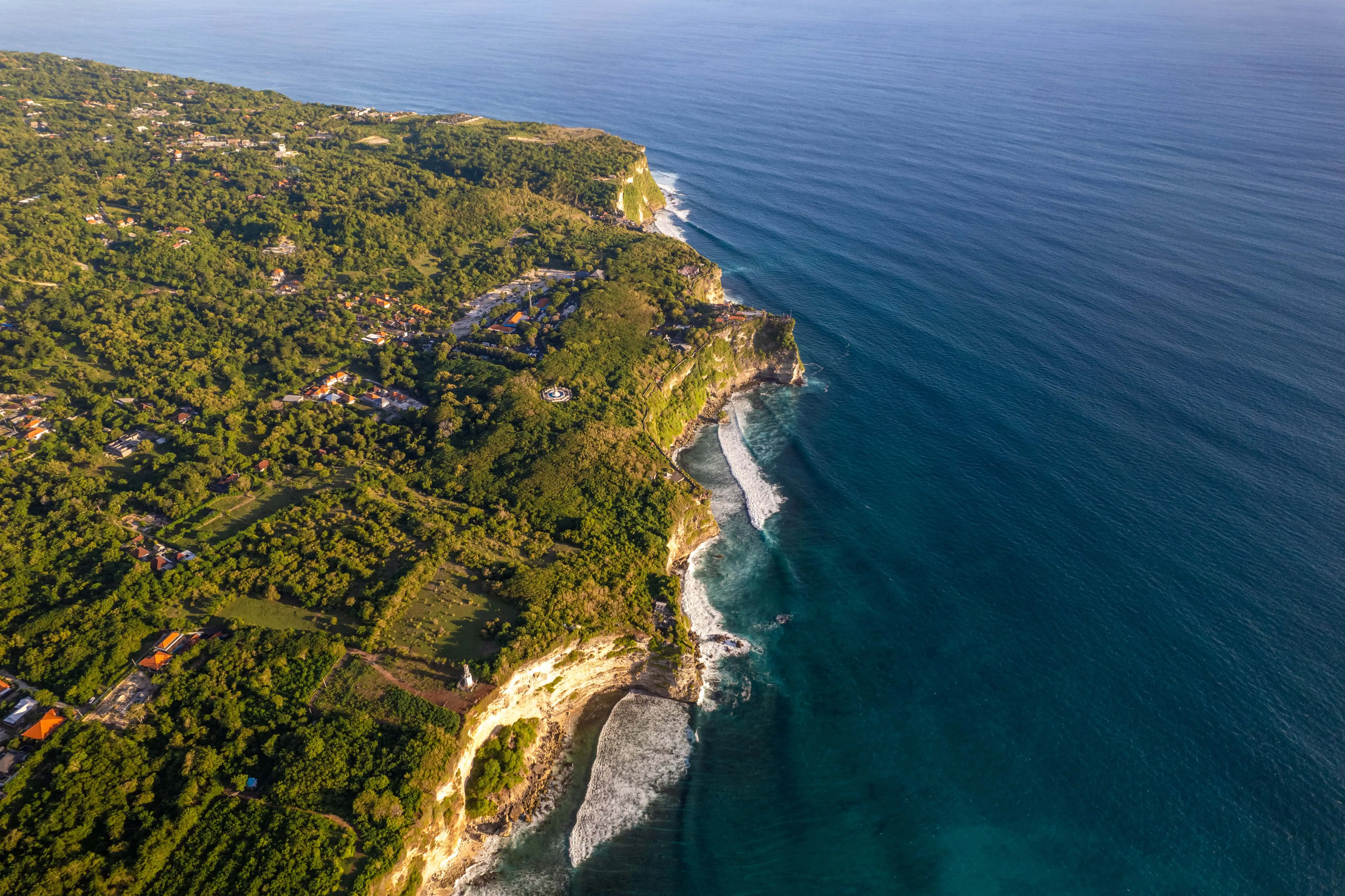 Rocky cliff coastline and ocean, sea, near Uluwatu temple and Batu Jaran in Bali, Indonesia. High quality photo