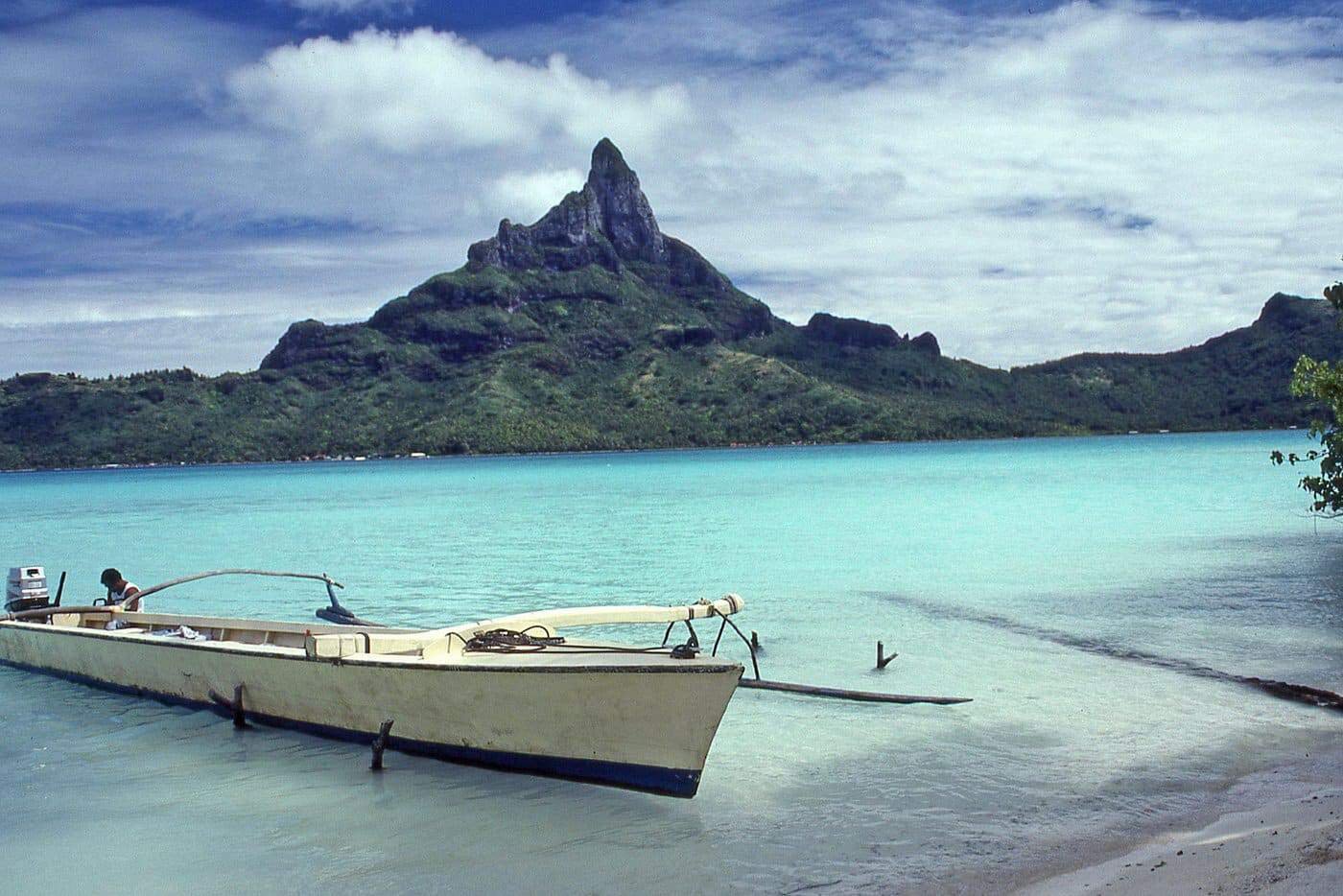 Traveling To French Polynesia: 26 Things You Must Know! 18 Mount Otemanu and a boat