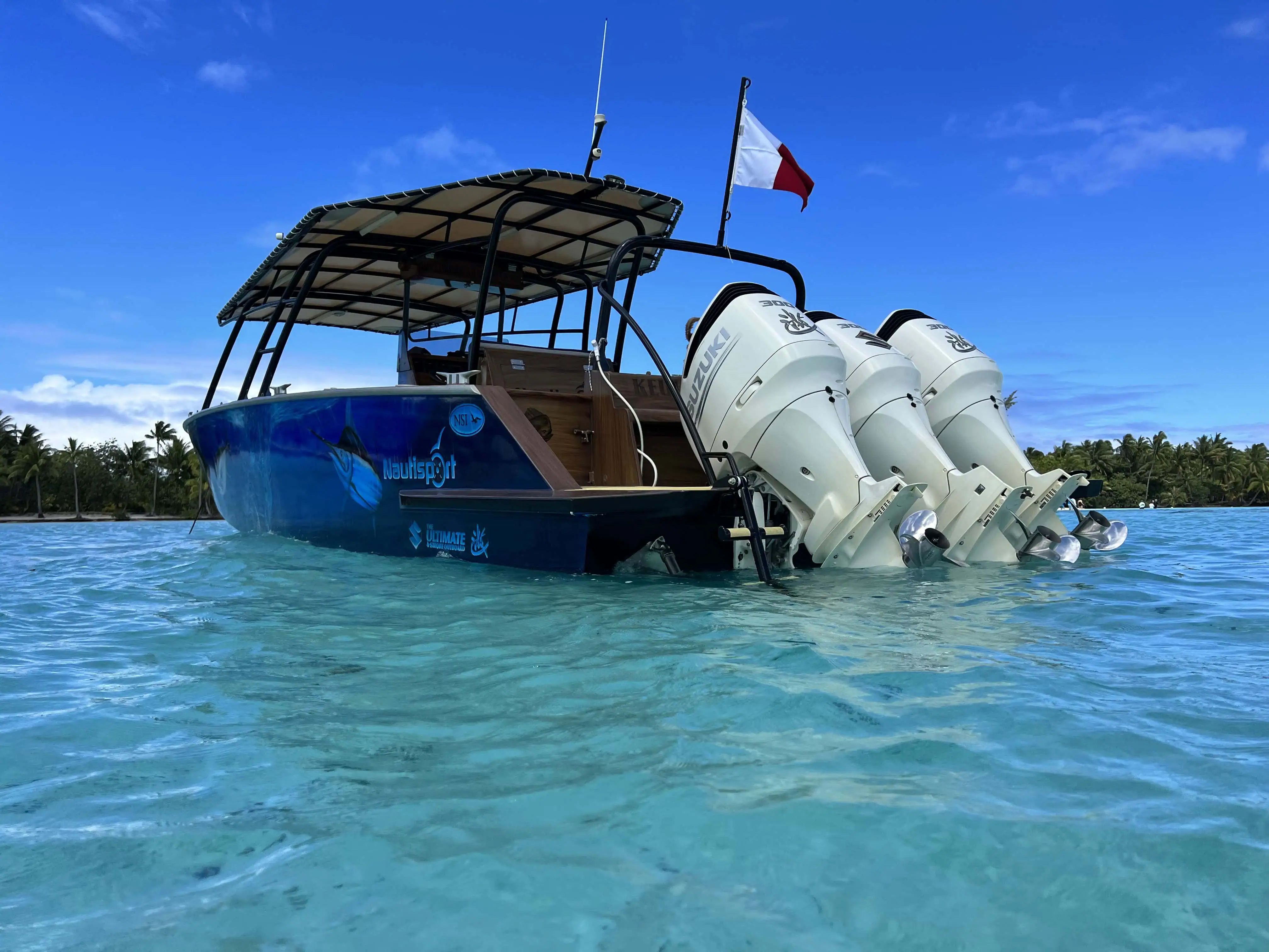 Boat in the waters of Tahaa