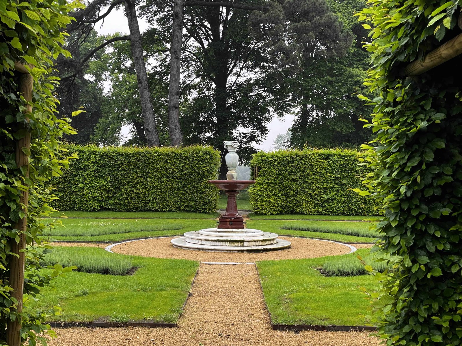 How to Visit the Royal Greenhouses of Laeken in 2026? 18 Statues along the trail