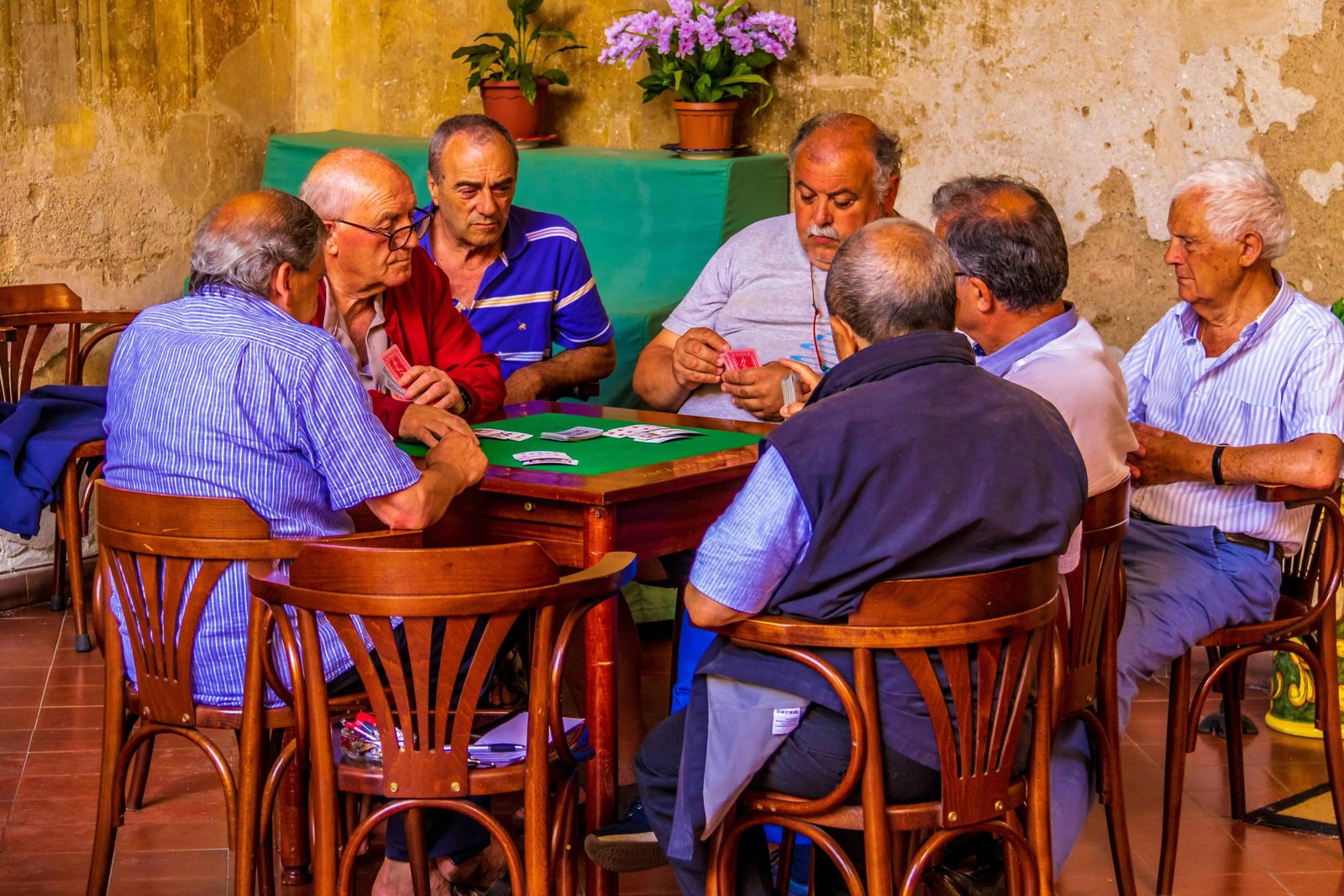 What To See In Sorrento Italy In One Day? 10 Sitting around a table