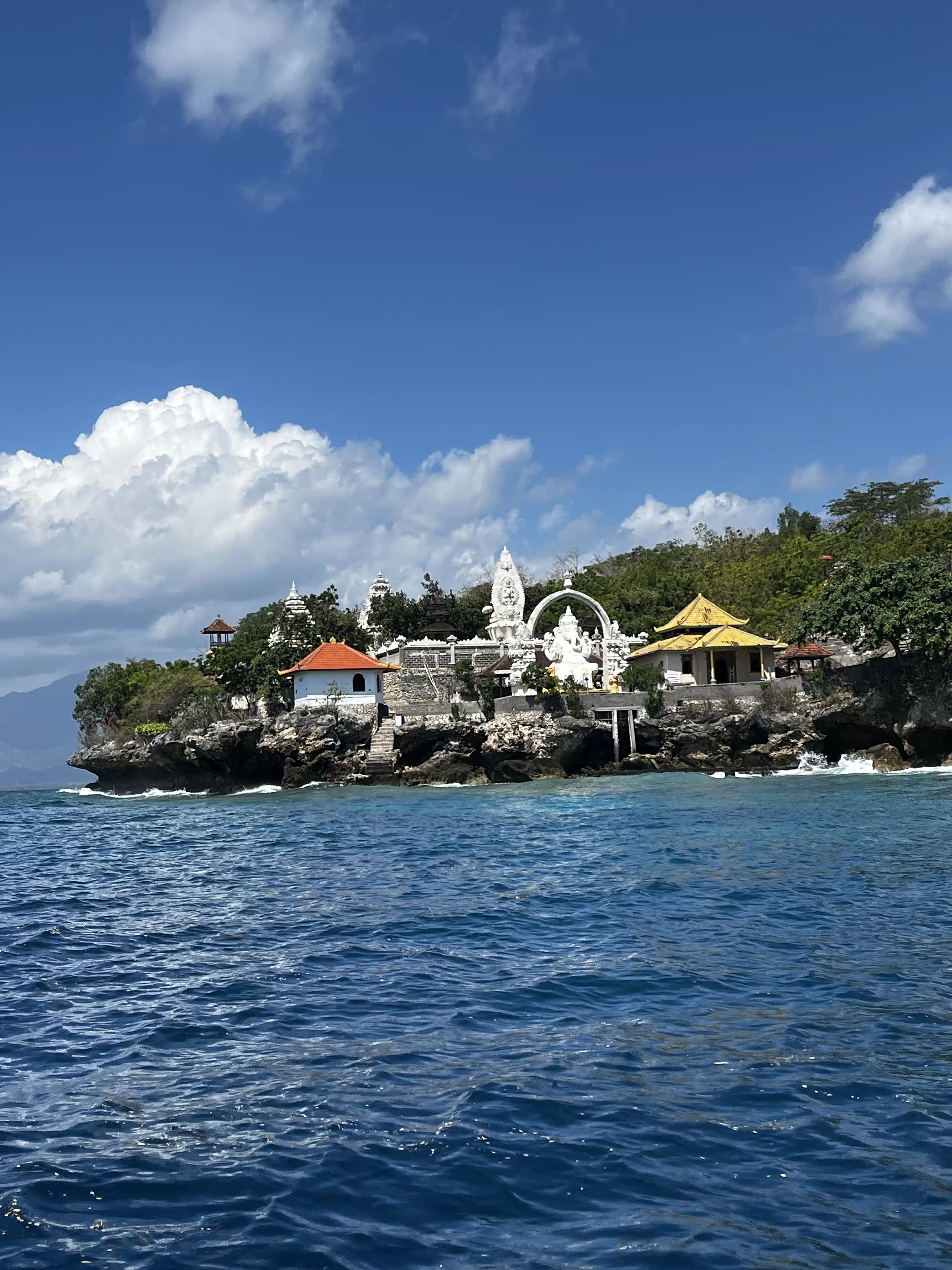 You'll pass a temple on the way back to Permuteran.