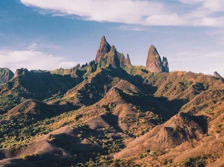 Ua Pou Marquesas Islands: A Full Guide For First-Timers 5 The Ua Pou mountain range with trees and bushes