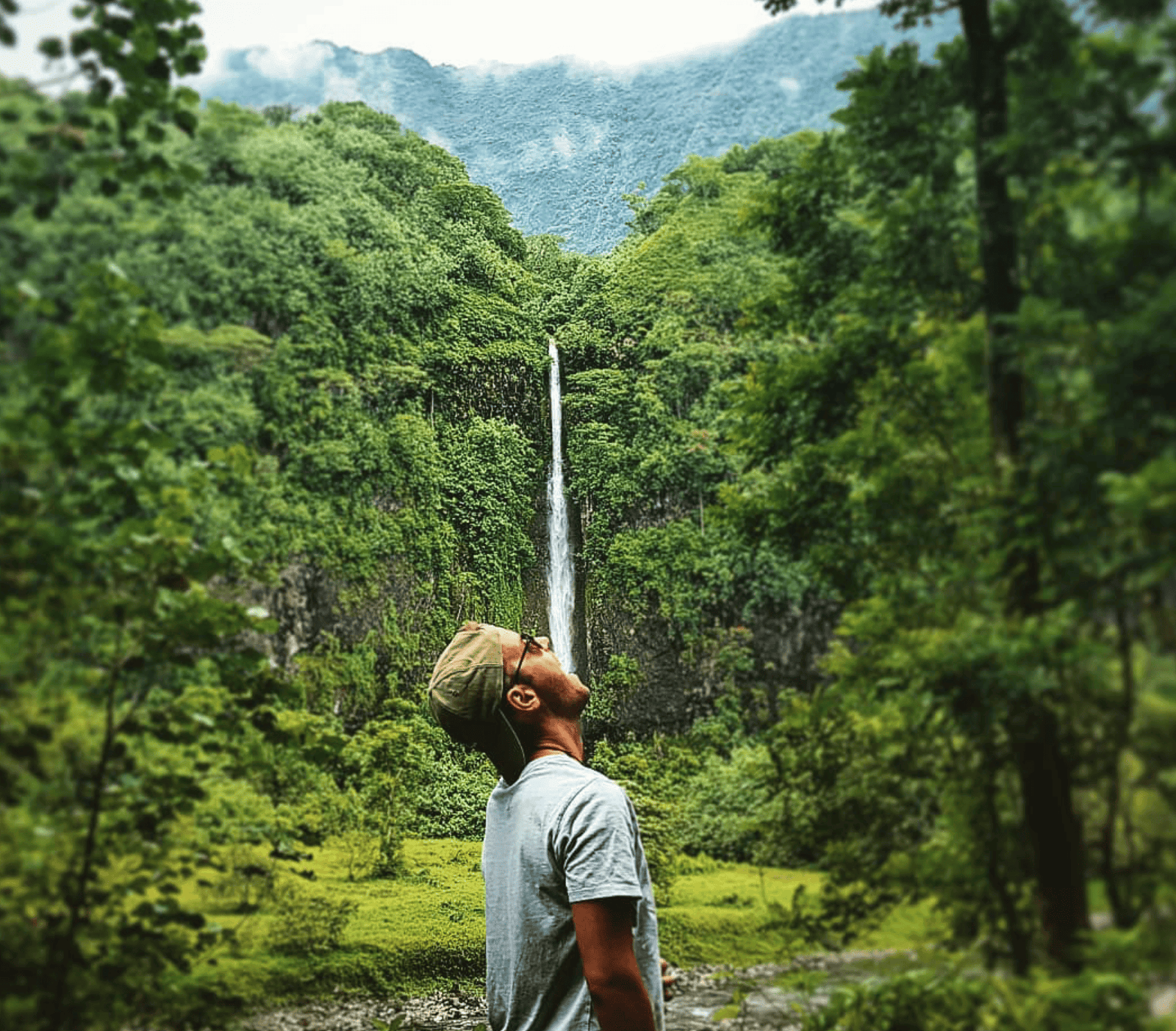 Papenoo Valley Waterfalls: Guide to a 4WD Tour! 2 Guy standing in front of one of the Papenoo Valley Waterfalls.