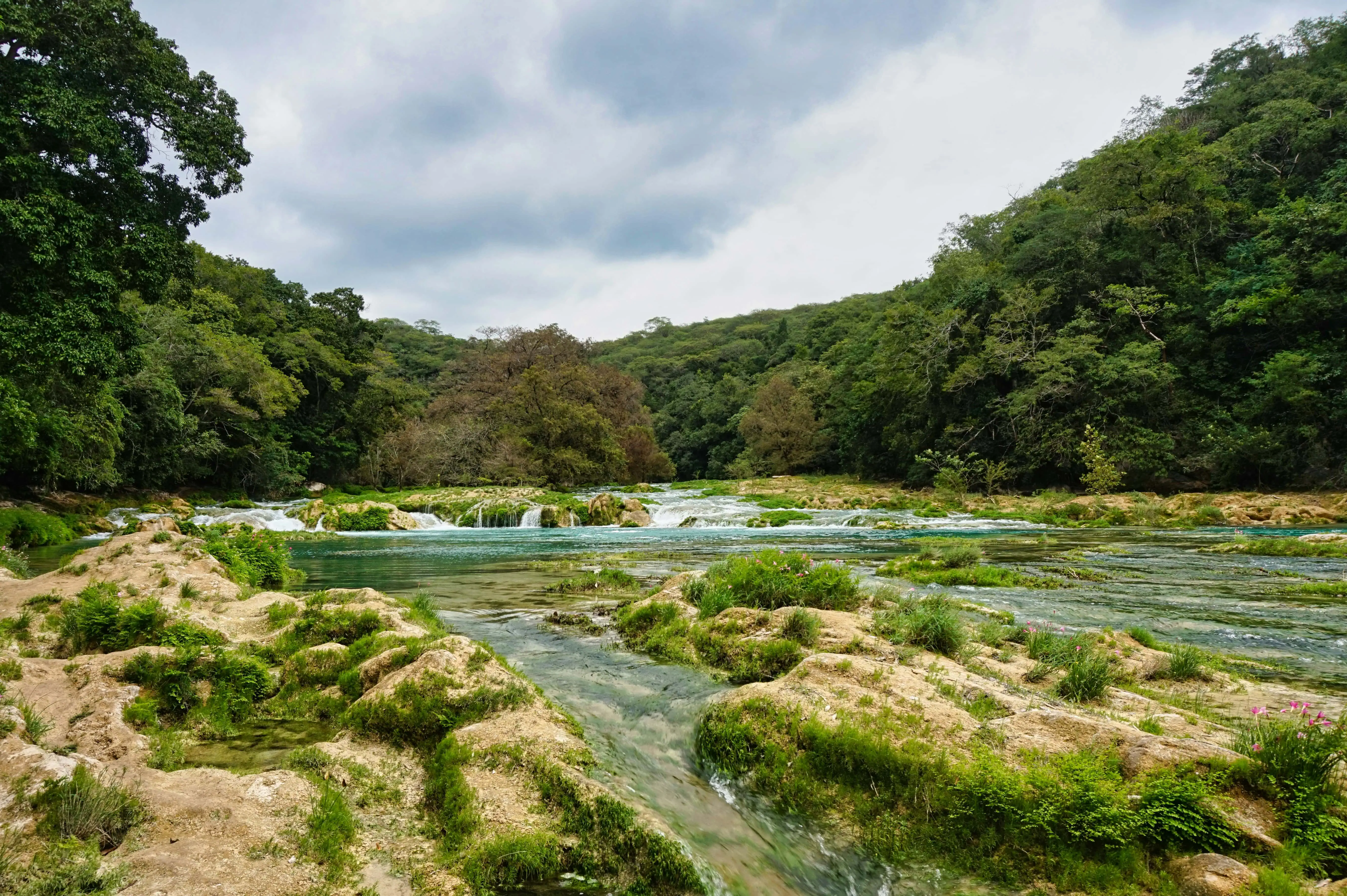 A river and little waterfall at the cascade de tamul in Huasteca Potosina in Mexico.