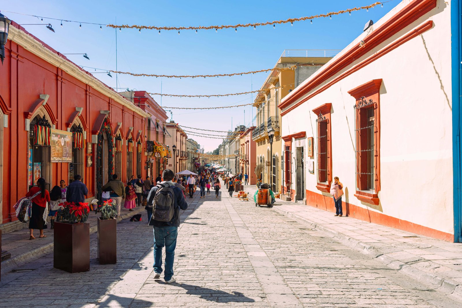 21 Best Places To Visit In Mexico for Couples in 2026! 8 Man walking in Oaxaca city center