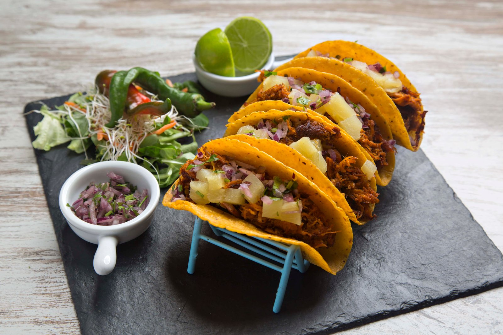 21 Best Places To Visit In Mexico for Couples in 2026! 4 Tacos al Pastor served in a taco on a plate