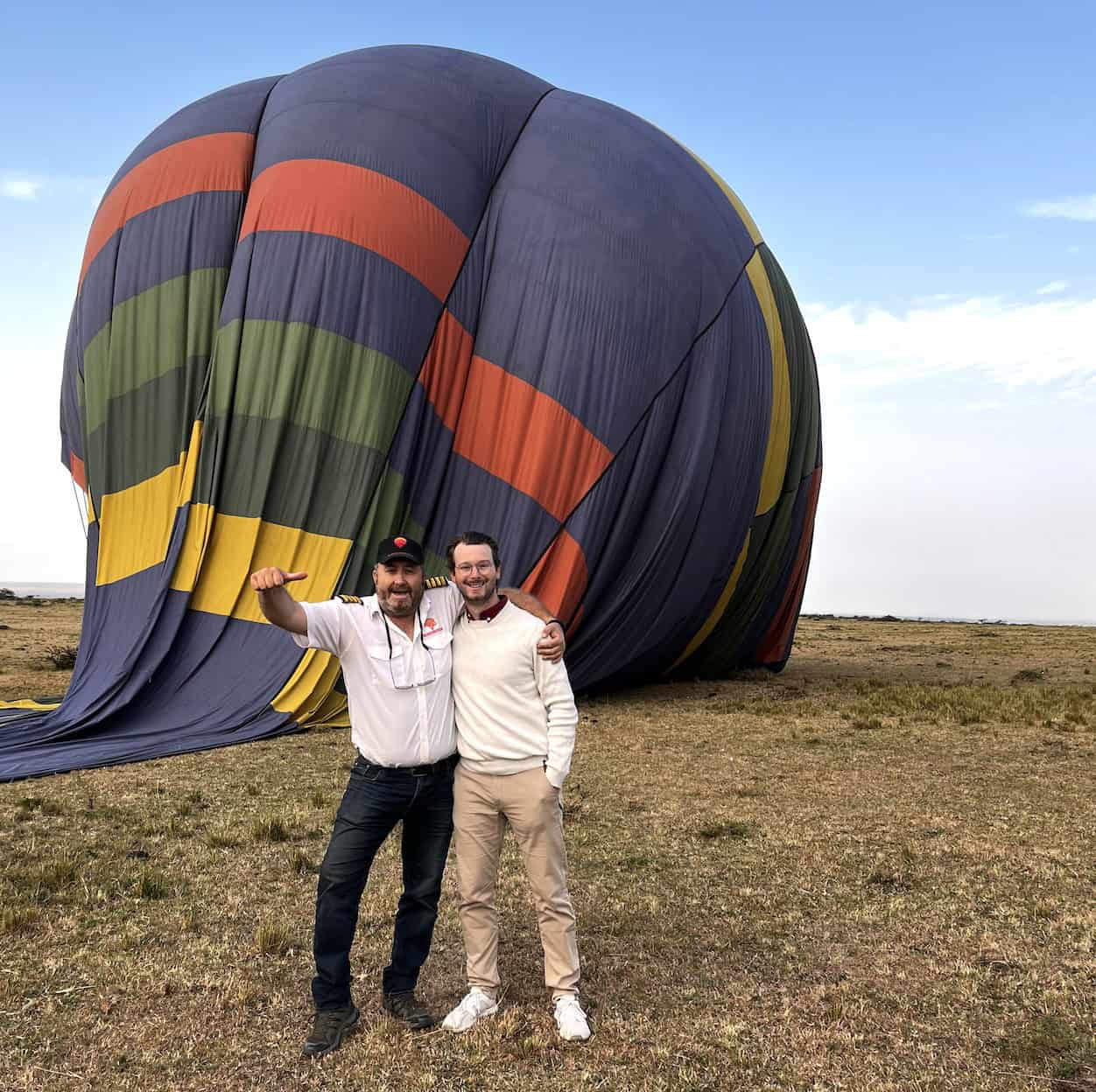 A picture of Alexander and the pilot of an African hot air balloon safari