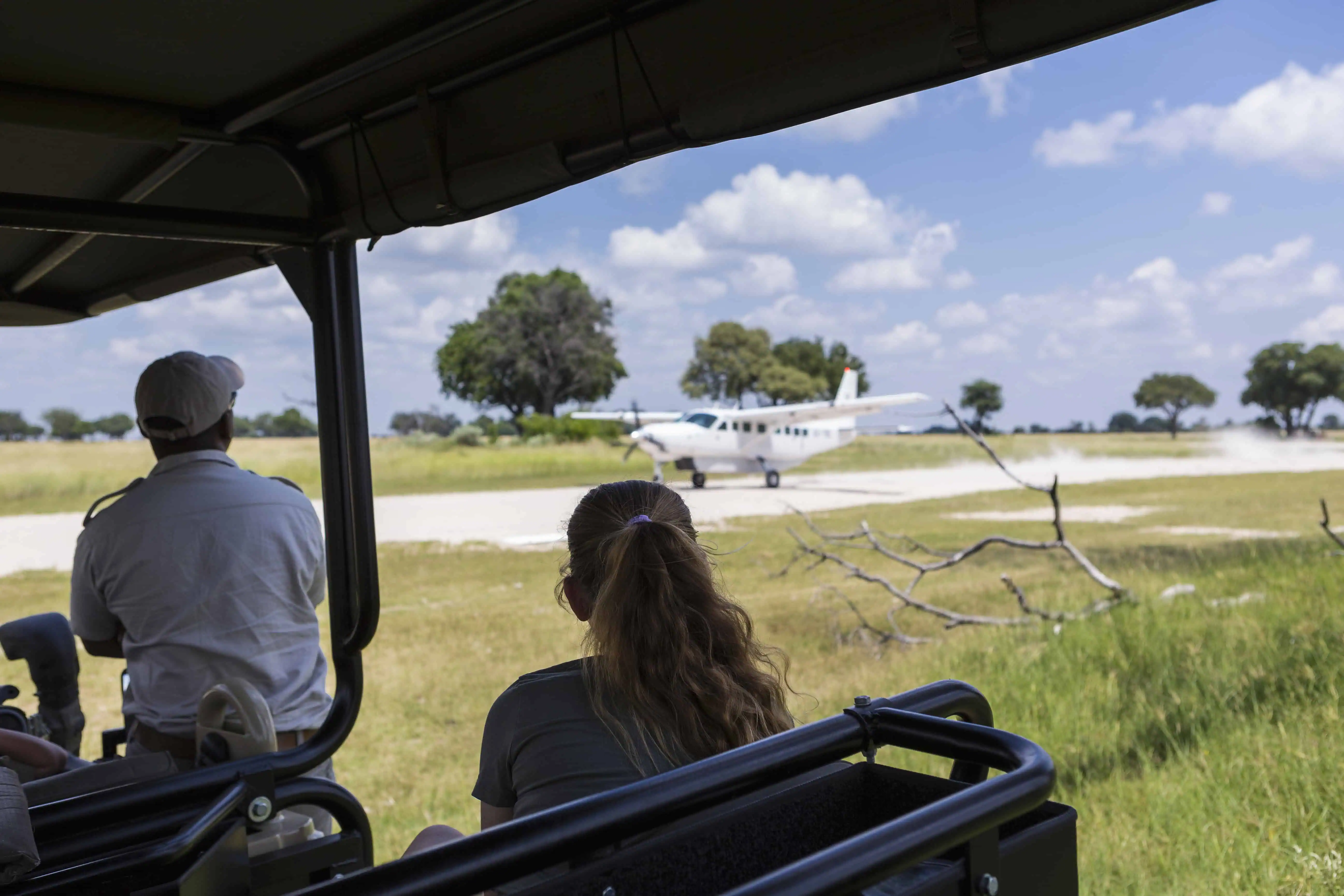 bush plane on dirt runway,landing, in Amboseli national park Kenya