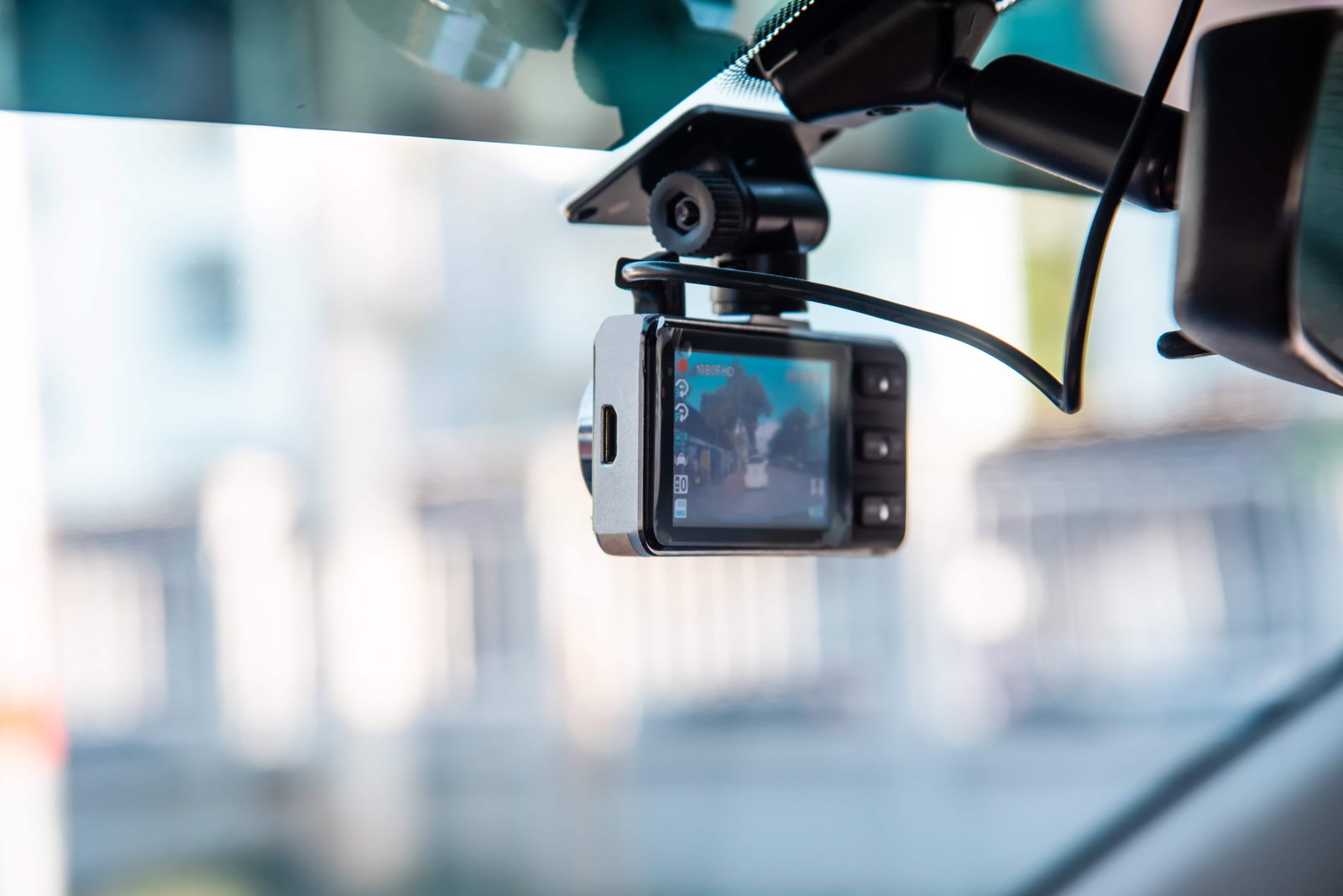 The Ultimate Guide to Road Trip Accessories for Couples 8 Car video camera attached to the windshield to record driving and prevent danger from driving