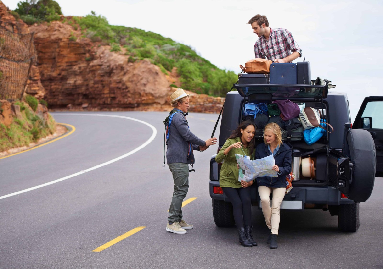 The Ultimate Guide to Road Trip Accessories for Couples 1 Road trip with friends, thinking about the road trip accessories