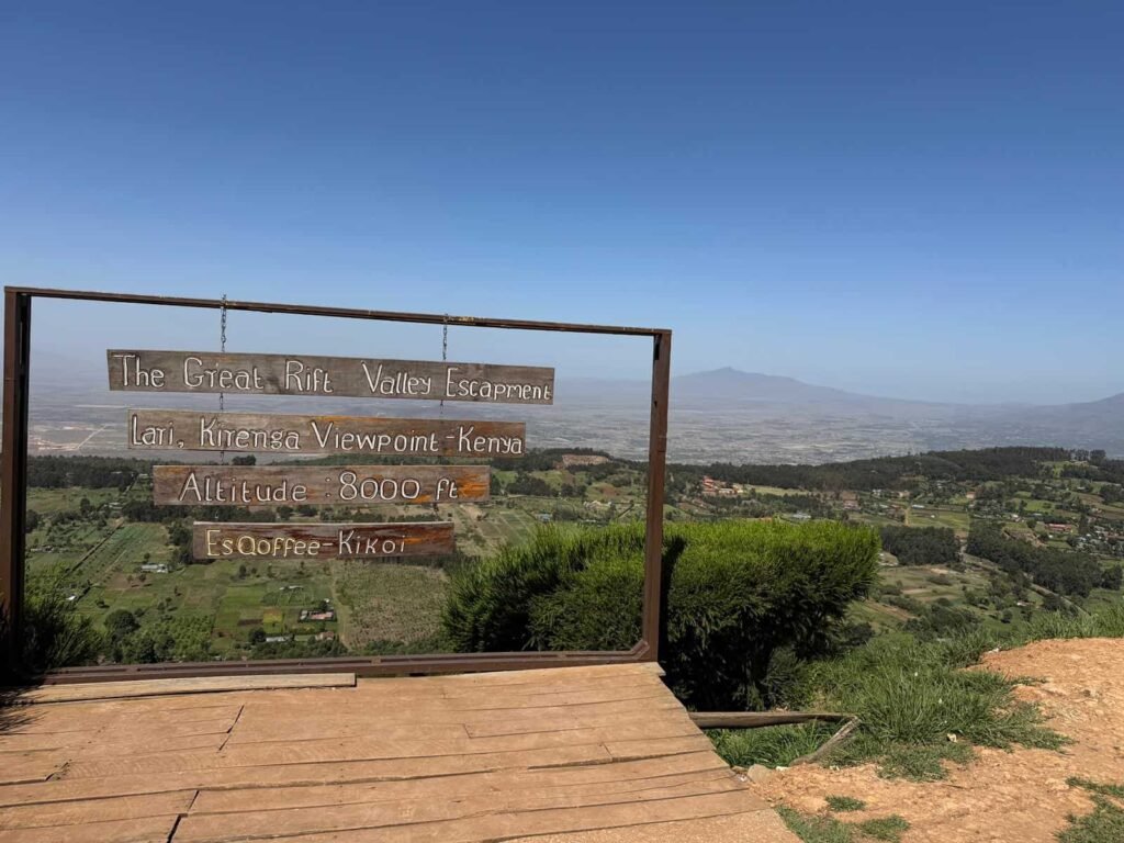 Best hotels in Naivasha Kenya: 11 picks by budget and vibe (2026 Guide) 6 Vivid view from the Great Rift Valley escarpment at Lari, Kirenga Viewpoint in Kenya, showcasing lush agricultural landscapes and distant mountains, with clear blue skies above. Perfect for travel and adventure photography.