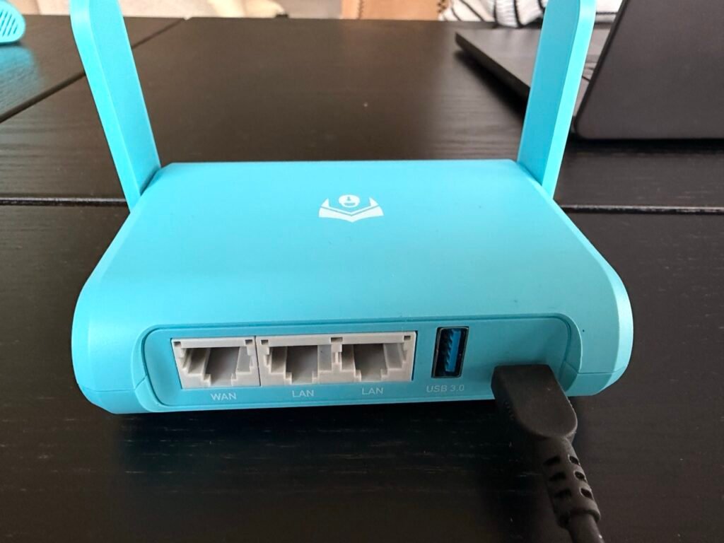 Best VPN for remote work and travel (KeepYourHomeIP review) 5 Maui router from KeepYourHomeIP with the power outlet USB c cable