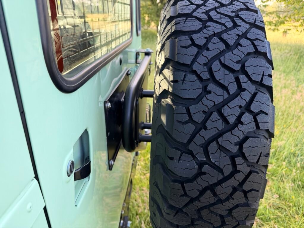 Defender swing away spare wheel carrier review: worth it for overland travel? 3 The behind of the Defender spare steel wheel carrier