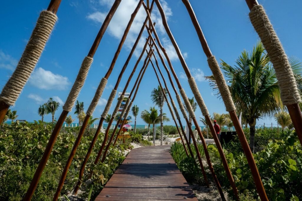 Costa Mujeres Guide: All-Inclusives, Things To Do And 5-Day Itinerary! 2 plateau leading to beach in Costa Mujeres