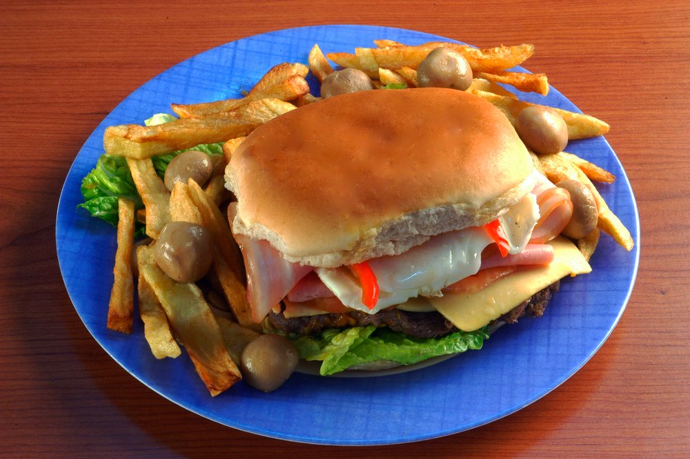 Best Restaurants in Montevideo 32 Chivito is a typical sandwich from Uruguay, with lettuce, tomato, bacon, beef, fried or boiled eggs and cheese.